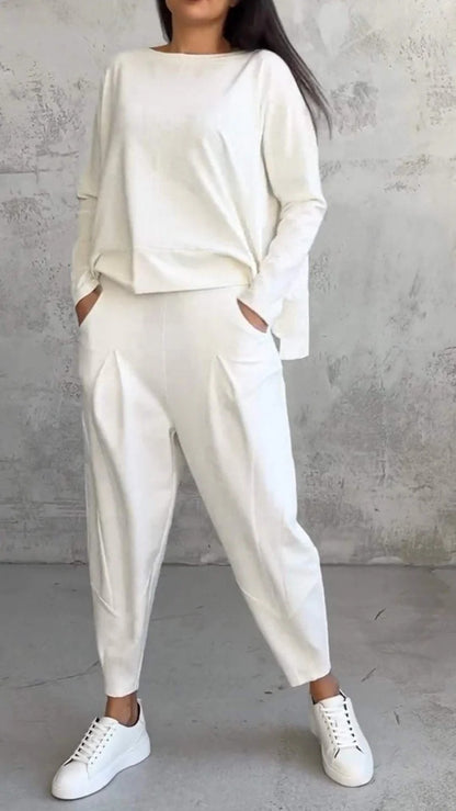 Conjunto de dos piezas de top y pantalón de manga larga con cuello redondo y color liso para mujer
