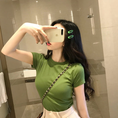 Camiseta informal de manga corta con cuello redondo y color liso para mujer