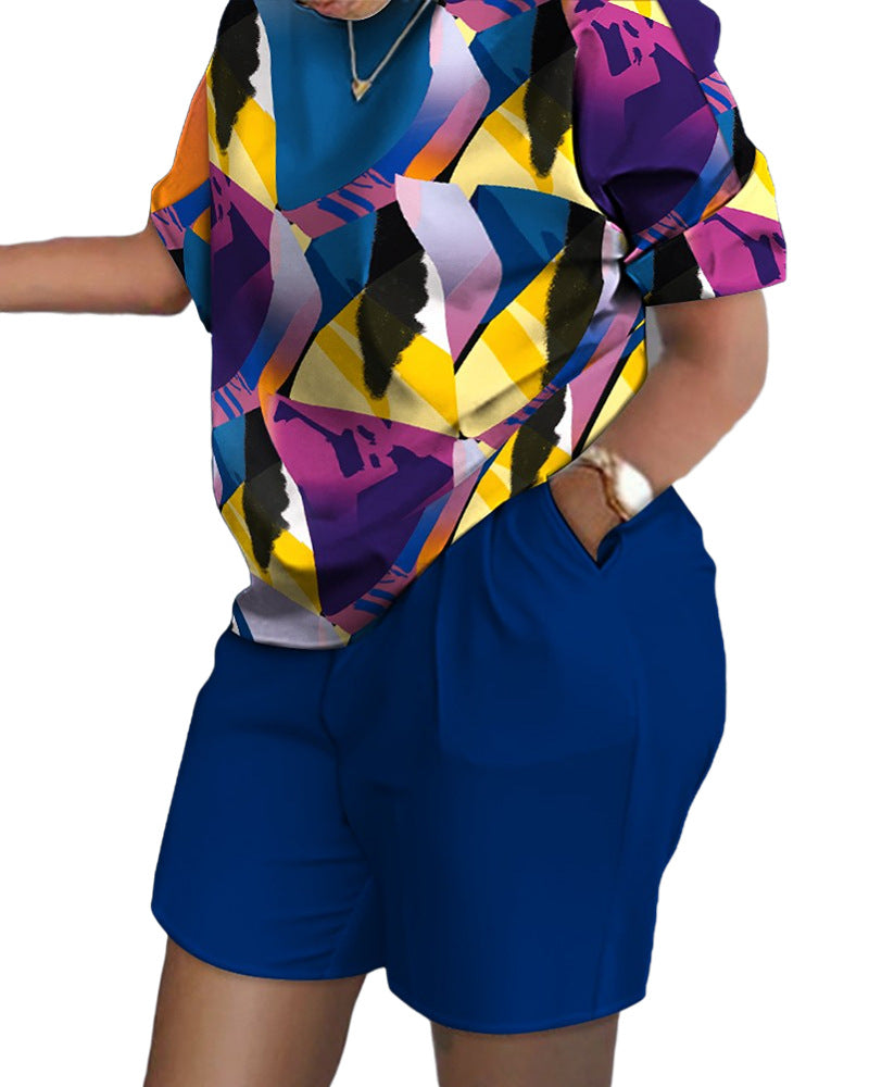 Conjunto de dos piezas de top y pantalones cortos de manga corta con cuello redondo y estampado gráfico informal para mujer