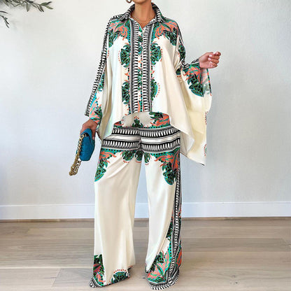 Conjunto de dos piezas de blusa y pantalones holgados con mangas murciélago y estampado informal de verano para mujer