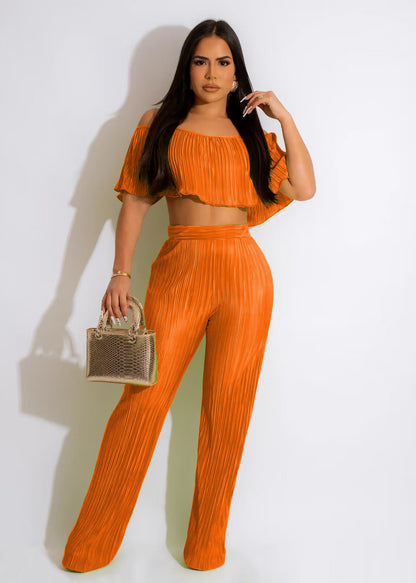 Conjunto de dos piezas de top corto con hombros descubiertos y pantalones casuales de manga corta de color liso para mujer