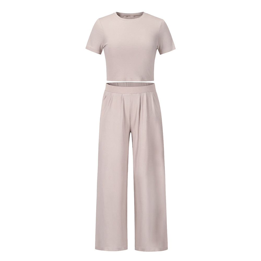 Conjunto de dos piezas de top de manga corta y pantalón ancho de color liso informal de verano para mujer