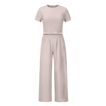 Conjunto de dos piezas de top de manga corta y pantalón ancho de color liso informal de verano para mujer