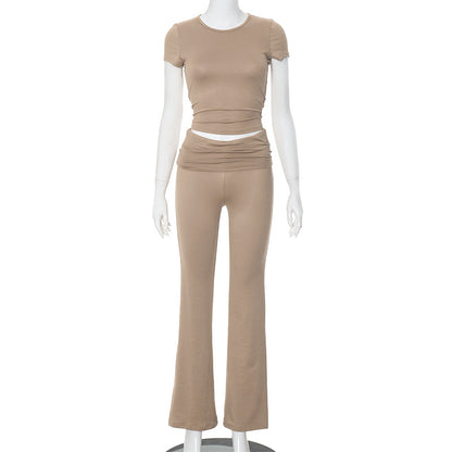 Conjunto de dos piezas formado por top corto y pantalón de manga larga, cuello redondo, color liso, informal, a la moda para mujer