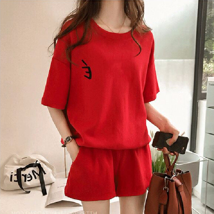 Conjunto de 2 piezas de camiseta de manga corta con cuello redondo, pantalones cortos y cintura definida, estampado de color liso y holgado para mujer