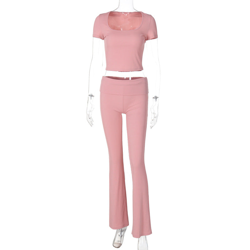 Conjunto de dos piezas de top corto y pantalones de manga corta con cuello redondo y color liso para mujer de verano