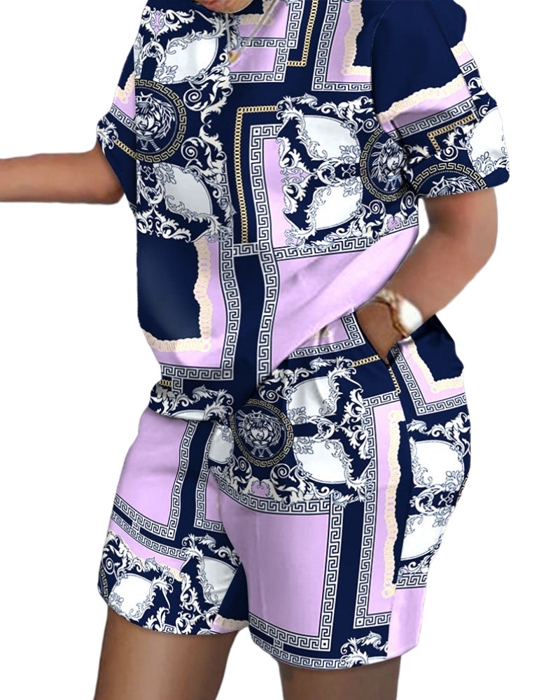 Conjunto de dos piezas de top y pantalones cortos de manga corta con cuello redondo y estampado gráfico informal para mujer