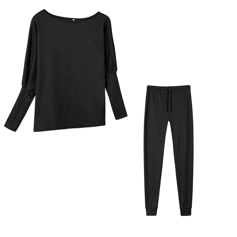 Conjunto de dos piezas formado por top y pantalón ajustado, manga larga, hombros descubiertos, color liso, informal, a la moda para mujer