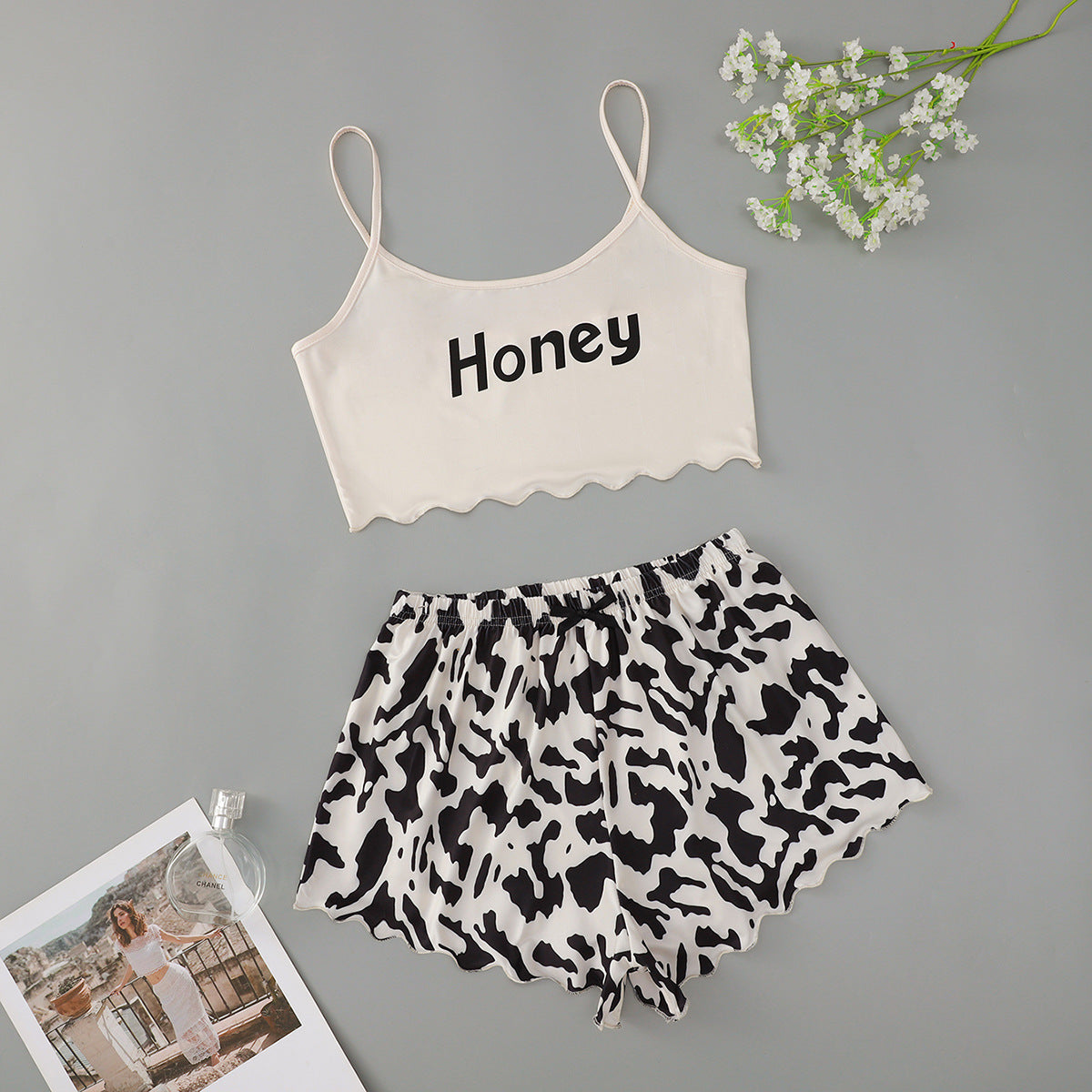 Conjunto de pijama informal atrevido con top corto sin mangas y pantalones cortos para mujer