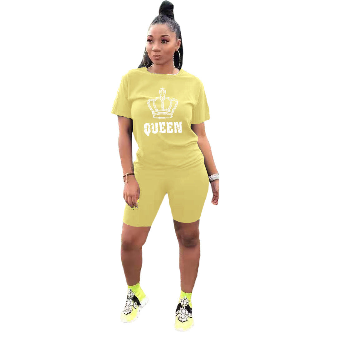 Conjunto deportivo informal de dos piezas para mujer: camiseta de manga corta con cuello redondo y pantalones cortos de color liso