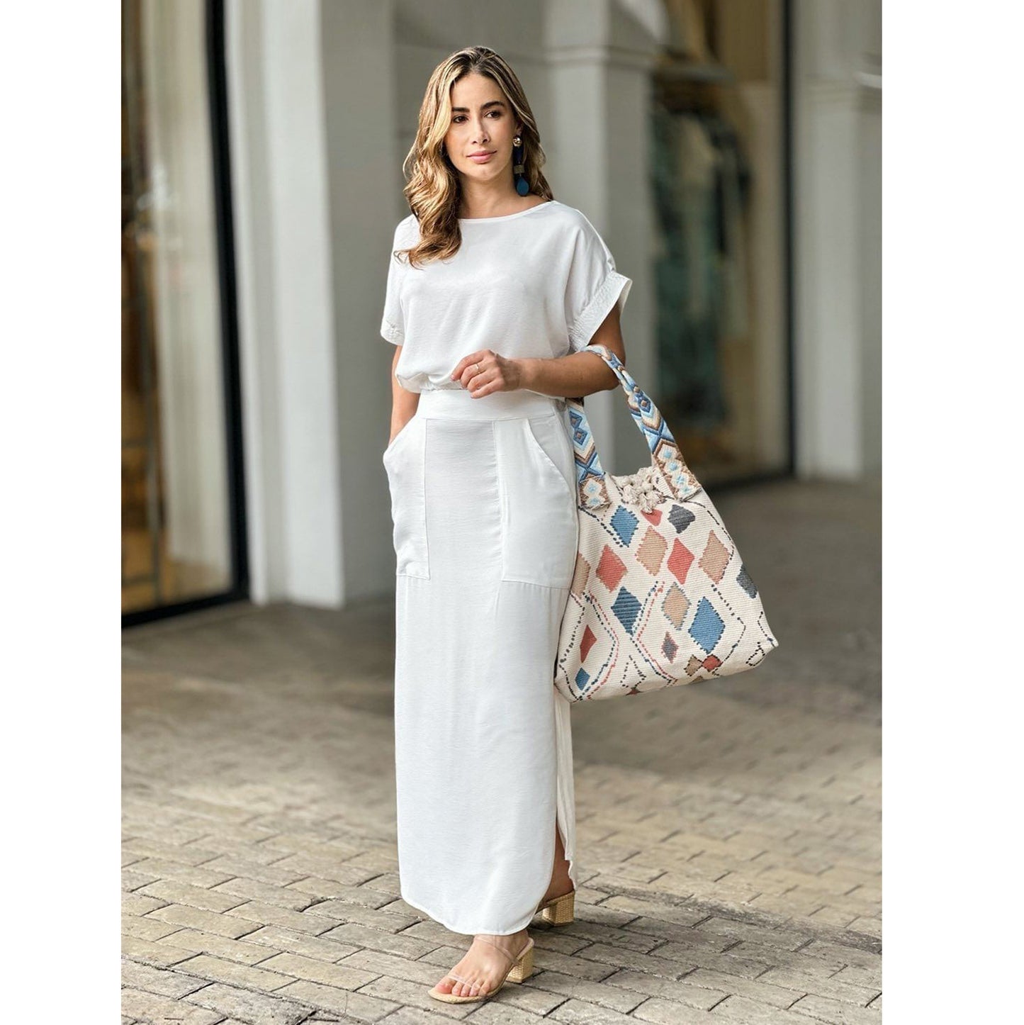Conjunto de dos piezas formado por top y falda con abertura, manga corta, color liso, informal, para mujer