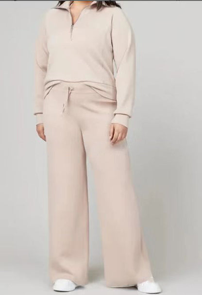 Conjunto de dos piezas formado por top y pantalón con cremallera, manga larga, color liso, informal, para mujer