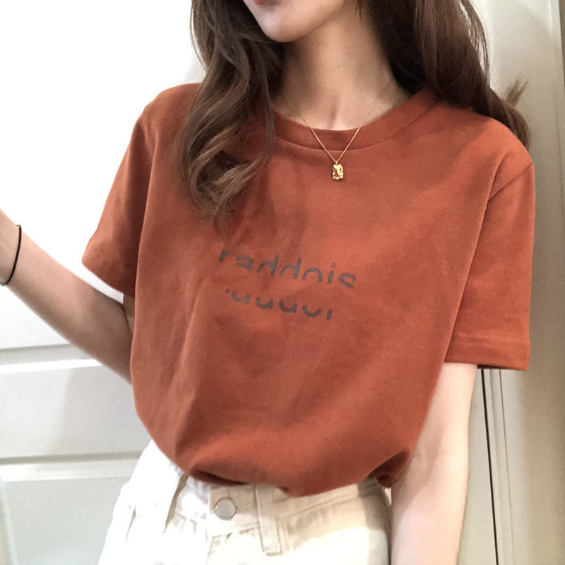 Camiseta informal de manga corta con cuello redondo y estampado de letras en color liso para mujer