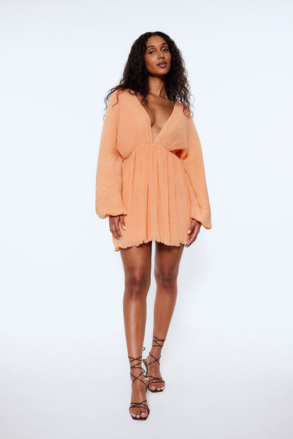 Vestido informal sexy de color sólido, suelto, de manga larga y escote en V profundo para mujer