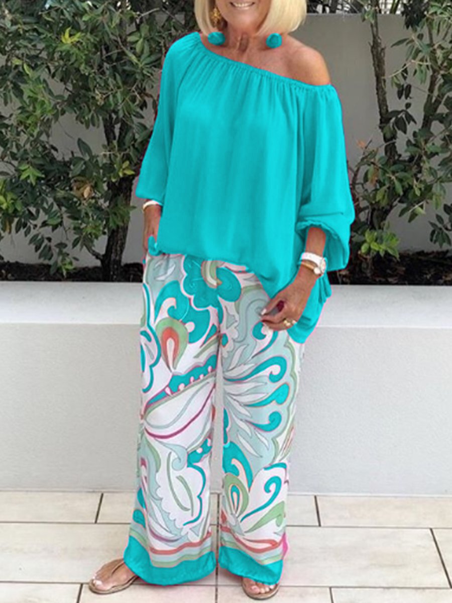 Conjunto de dos piezas para mujer: top de color liso con hombros descubiertos y pantalón estampado informal