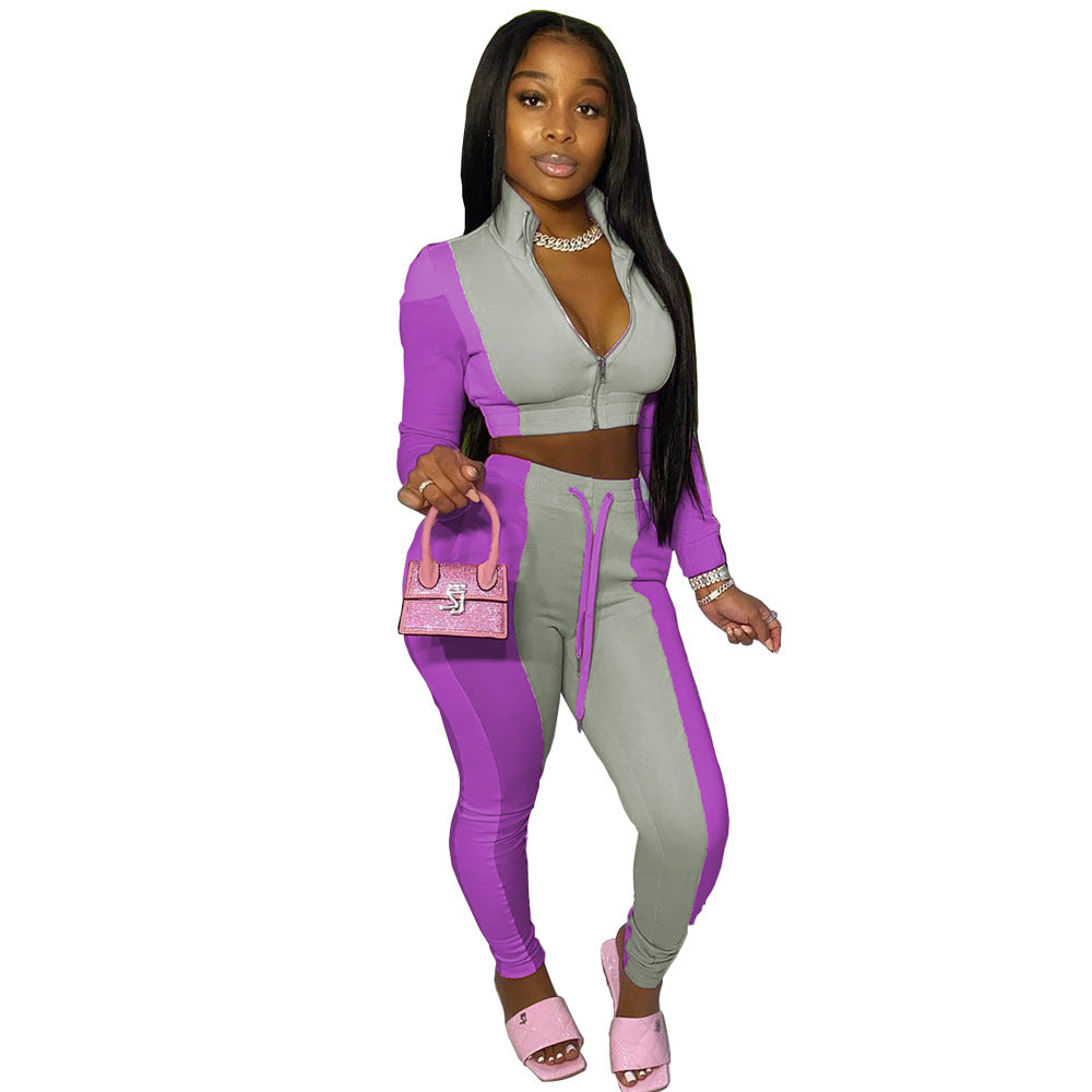 Conjunto deportivo informal de dos piezas para mujer: top corto con cremallera y pantalones ajustados con bloques de color