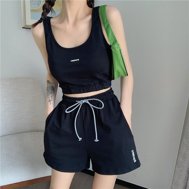 Conjunto deportivo informal de moda para mujer, con camiseta sin mangas y pantalones cortos con cuello en U