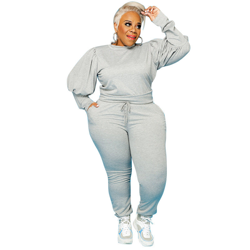 Conjunto de dos piezas de top y pantalones ajustados de talla grande para mujer, básico, informal, de color liso, con mangas largas abullonadas