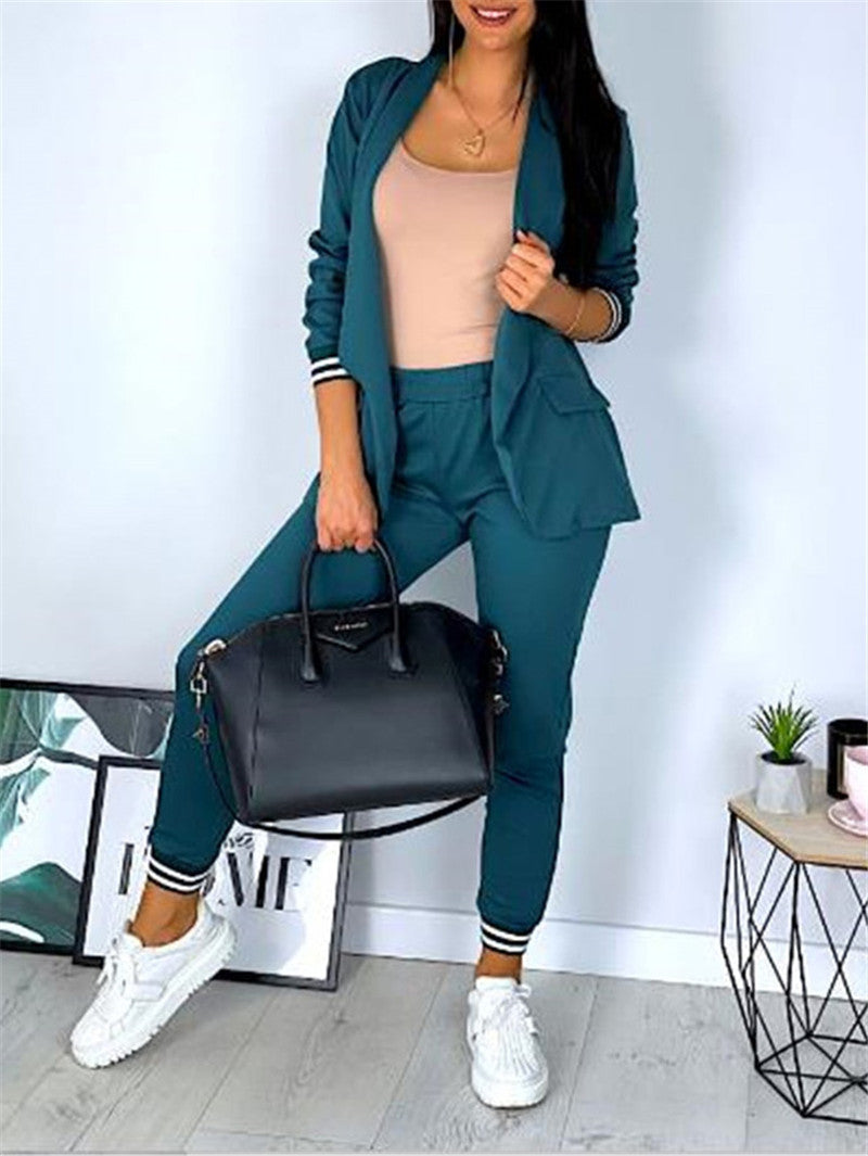 Conjunto de dos piezas formado por chaqueta y pantalón, manga larga, color liso, informal, a la moda para mujer
