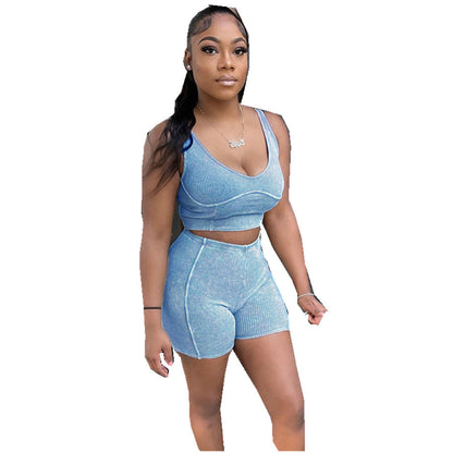 Conjunto casual de camiseta sin mangas y pantalones cortos deportivos de color sólido para mujer