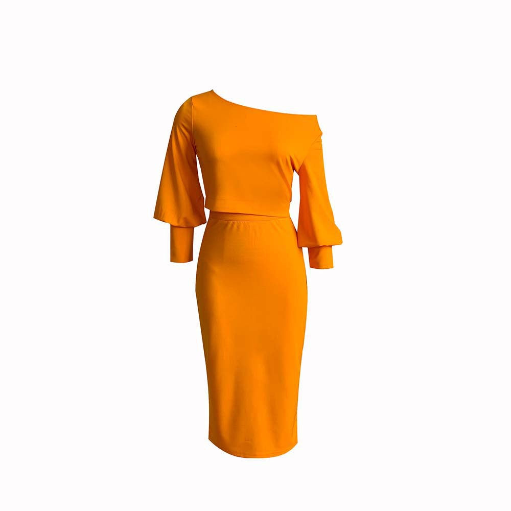 Conjunto de dos piezas formado por top y falda de cintura alta, manga larga, hombros descubiertos, color liso, informal, para mujer