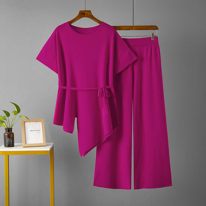 Conjunto de dos piezas de pantalón ancho y top irregular de color liso informal a la moda para mujer