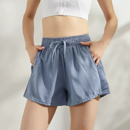 Pantalones cortos deportivos holgados e informales con doble bolsillo para mujer, para correr y hacer ejercicio, a la moda de verano