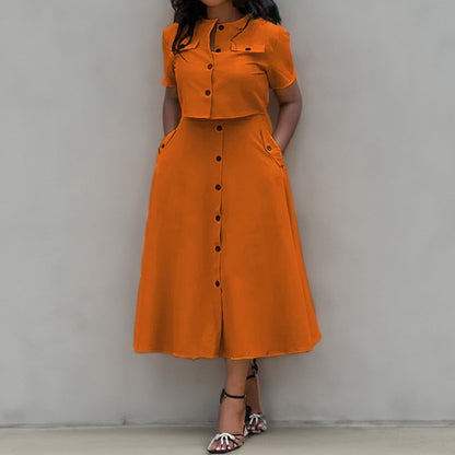 Conjunto de dos piezas formado por falda y pantalón corto, cuello redondo, manga corta y hebilla, informal, a la moda, para mujer