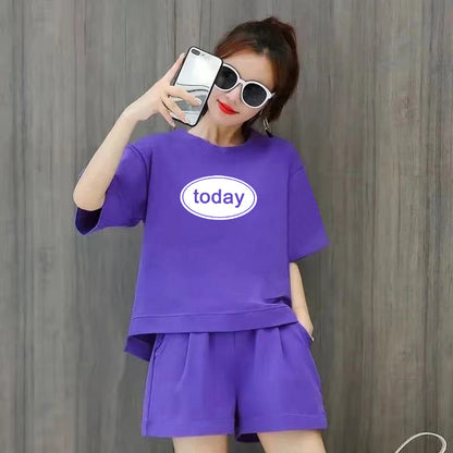 Conjunto de 2 piezas de camiseta de manga corta con cuello redondo, pantalones cortos y cintura definida, estampado de color liso y holgado para mujer