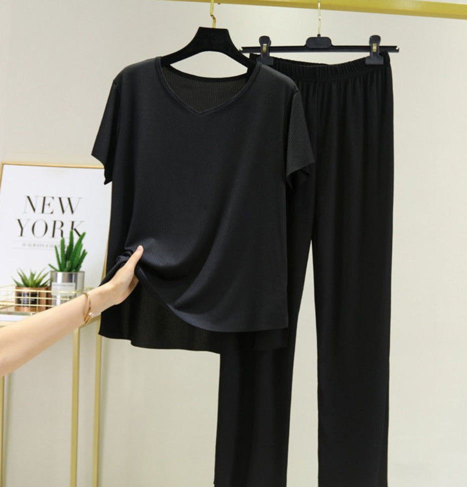 Conjunto de dos piezas de camiseta y pantalón de seda helada de color liso informal para mujer