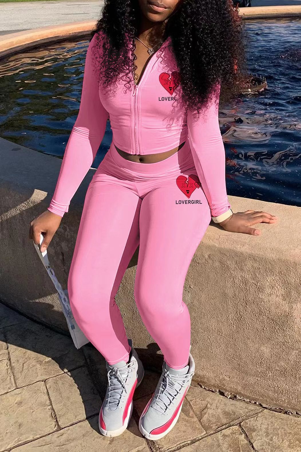 Conjunto deportivo informal de dos piezas con top y pantalones de manga larga con cremallera y estampado para mujer, corte ajustado
