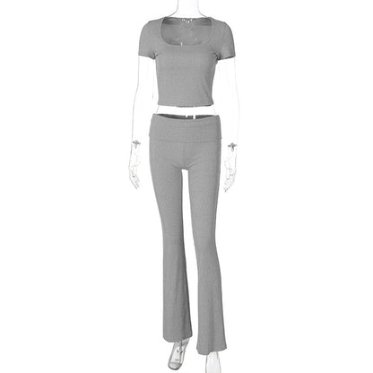 Conjunto de dos piezas de top corto y pantalones de manga corta con cuello redondo y color liso para mujer de verano