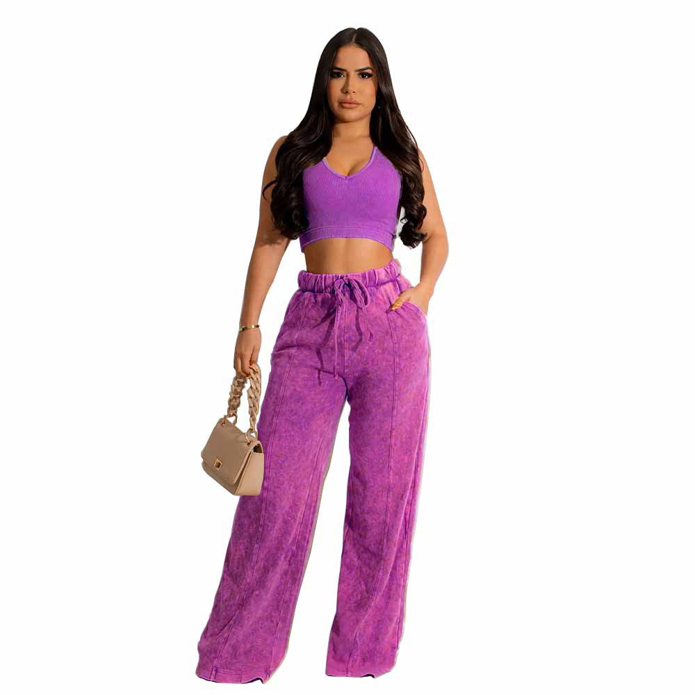 Conjunto de dos piezas de camiseta sin mangas y pantalones anchos de color liso para mujer
