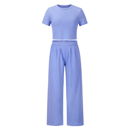 Conjunto de dos piezas de top de manga corta y pantalón ancho de color liso informal de verano para mujer