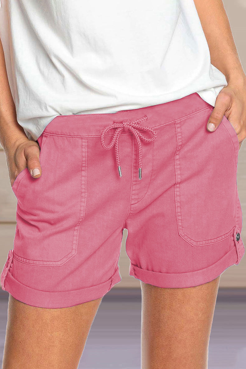 Pantalones cortos casuales de cintura elástica de color sólido a la moda para mujer