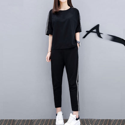 Conjunto de dos piezas de top y pantalón de manga corta con cuello redondo y rayas informales a la moda para mujer