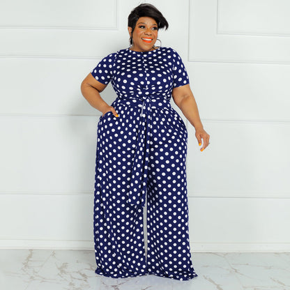 Traje informal de dos piezas con top de manga corta y pierna ancha con encaje de lunares para mujer de talla grande