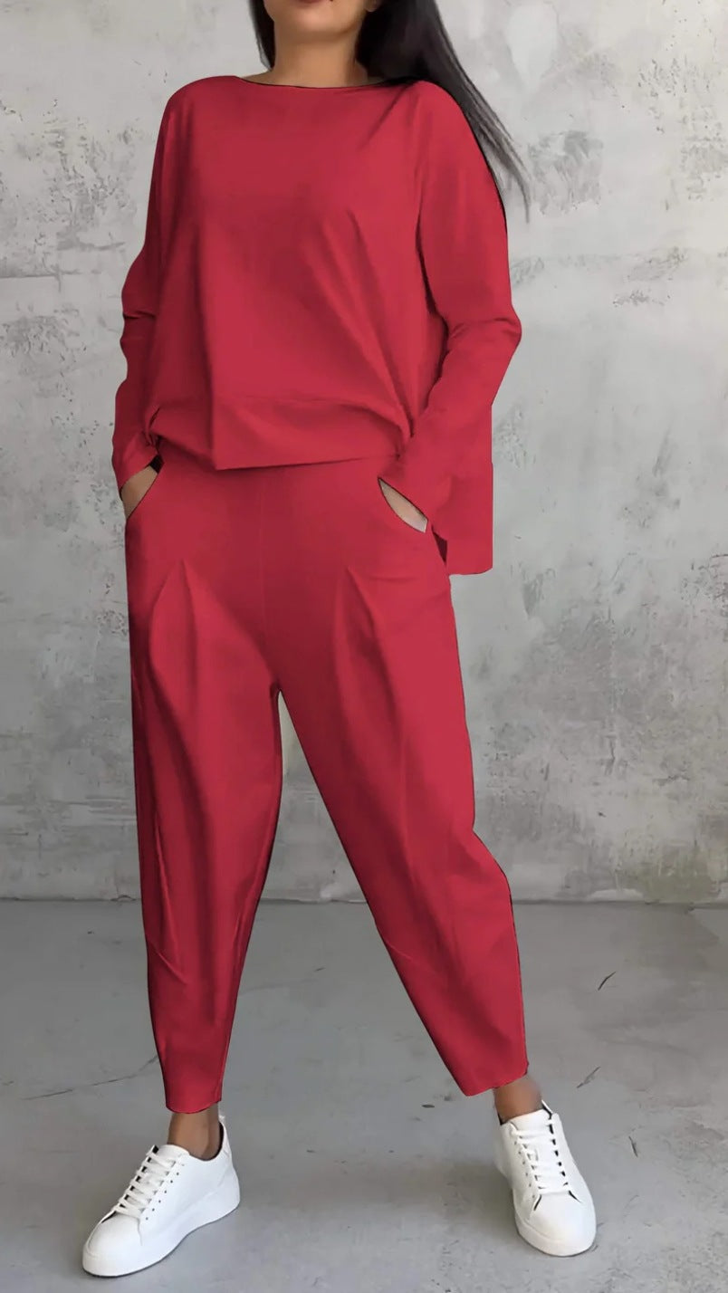 Conjunto de dos piezas de top y pantalón de manga larga con cuello redondo y color liso para mujer