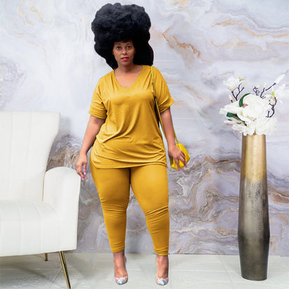 Conjunto de dos piezas para mujer, informal, de talla grande, color liso, con escote en V, camiseta holgada con abertura y pantalones ajustados