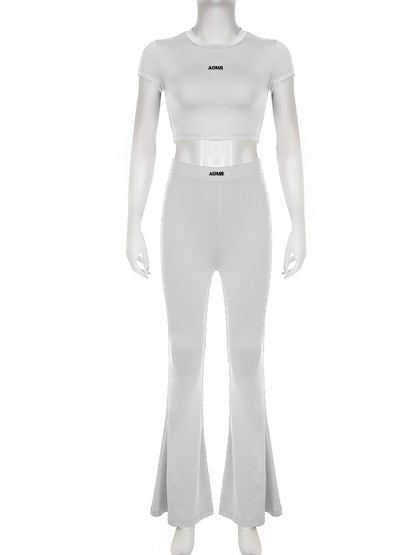 Conjunto de dos piezas de top y pantalón de manga corta de color liso informal para mujer
