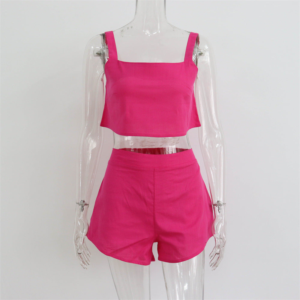 Conjunto de dos piezas de camiseta sin mangas y pantalones cortos de color liso para mujer