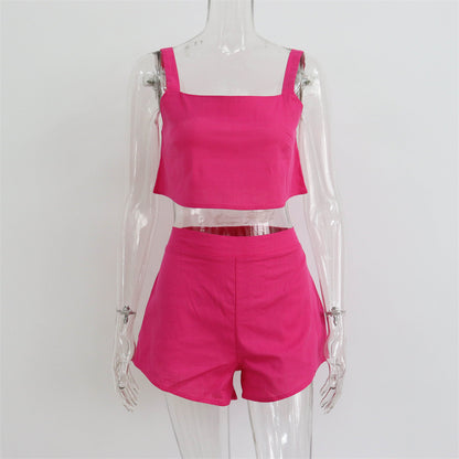Conjunto de dos piezas de camiseta sin mangas y pantalones cortos de color liso para mujer