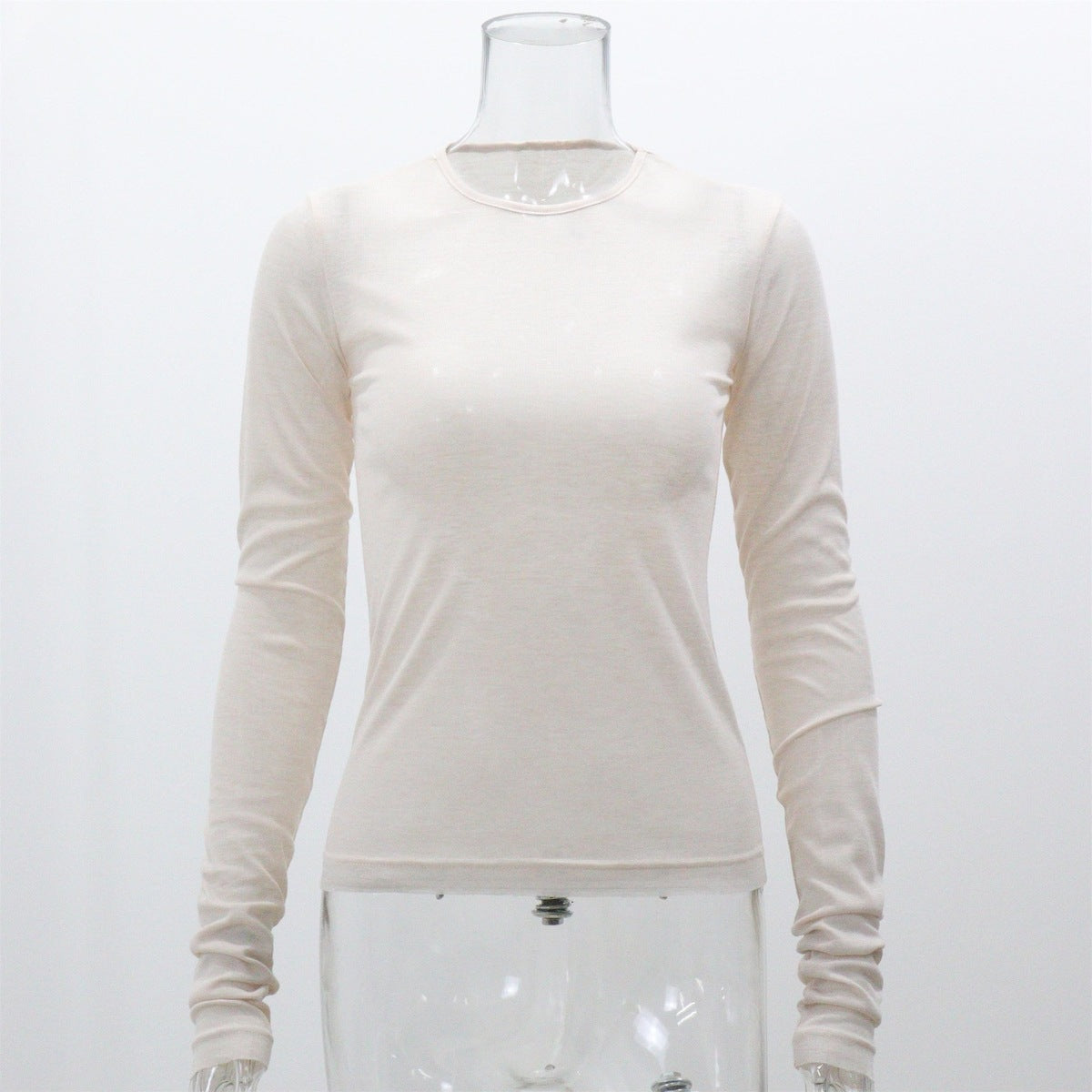 Camiseta informal de manga larga ajustada con cuello redondo y color liso para mujer