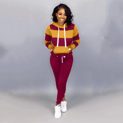Conjunto deportivo informal para mujer, de manga larga, a rayas, con capucha y pantalones de chándal con bloques de color
