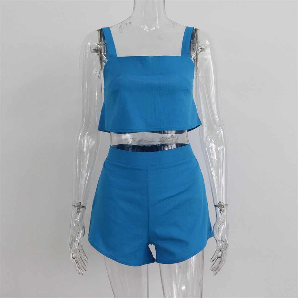 Conjunto de dos piezas de camiseta sin mangas y pantalones cortos de color liso para mujer