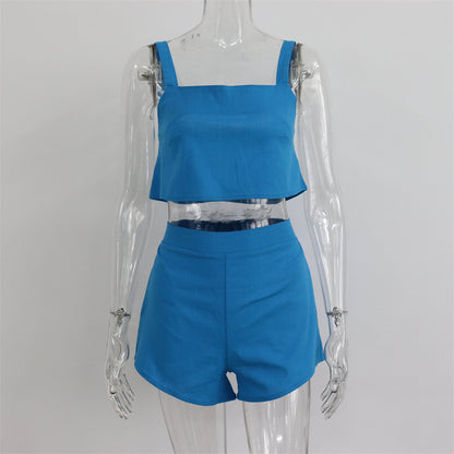 Conjunto de dos piezas de camiseta sin mangas y pantalones cortos de color liso para mujer
