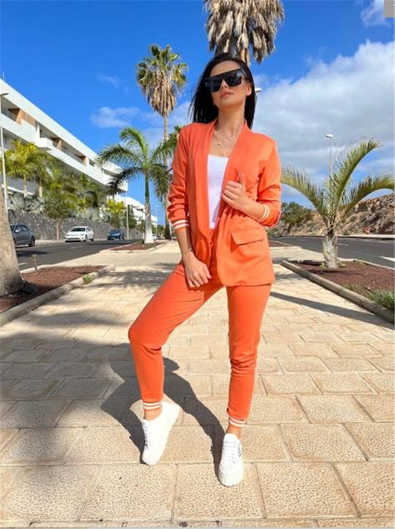 Conjunto de dos piezas formado por chaqueta y pantalón, manga larga, color liso, informal, a la moda para mujer