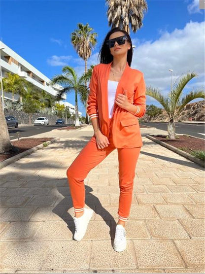 Conjunto de dos piezas formado por chaqueta y pantalón, manga larga, color liso, informal, a la moda para mujer