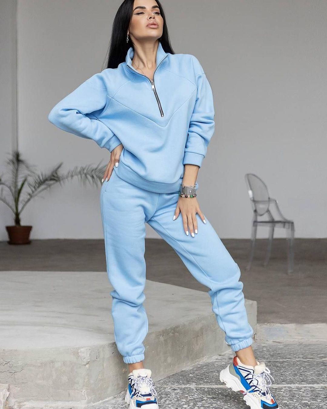 Conjunto de dos piezas de jersey deportivo informal con capucha y manga larga de color liso para mujer