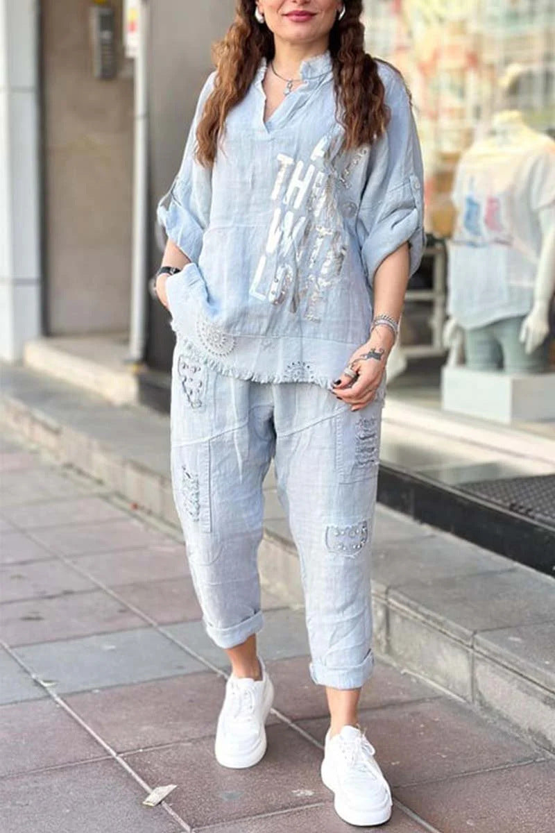 Conjunto de dos piezas de blusa y pantalones holgados con cuello en V y media manga para mujer